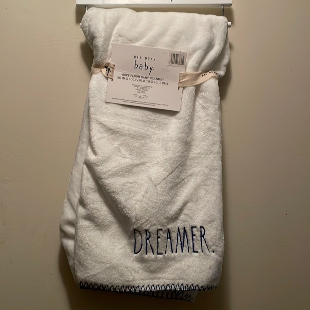 Raw Dunn super Soft Baby Blanket embroidered with Dreamer at the bottom.